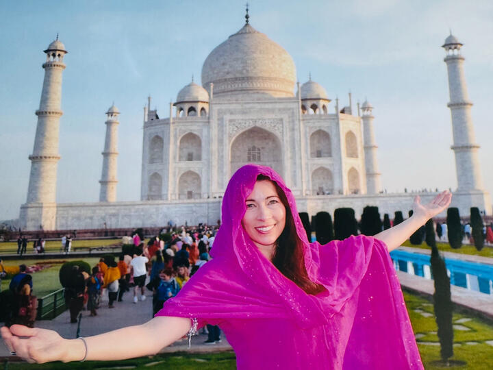 Monica Phillips at the Taj Mahal picture of a woman wearing pink in front of the Taj Mahal in Agra, India
